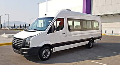 White minivan type transfer truck